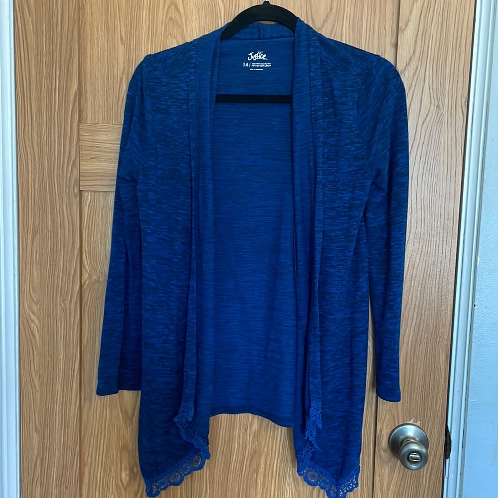 Loose fit cardigan with lace trim on the bottom!